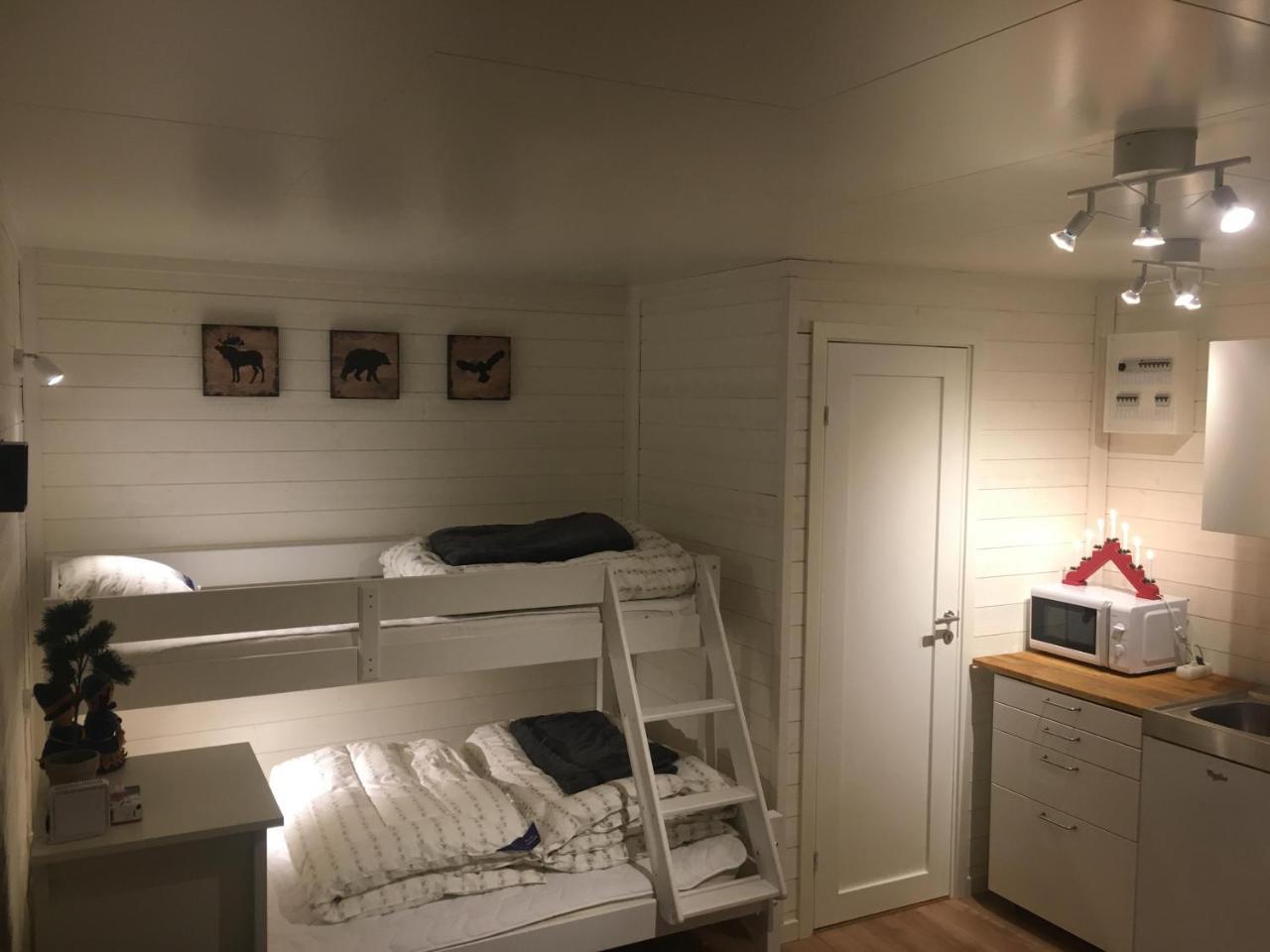Camp Caroli Wooden Cabins Jukkasjärvi Eksteriør bilde